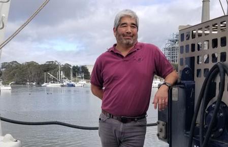 Scientist in red shirt